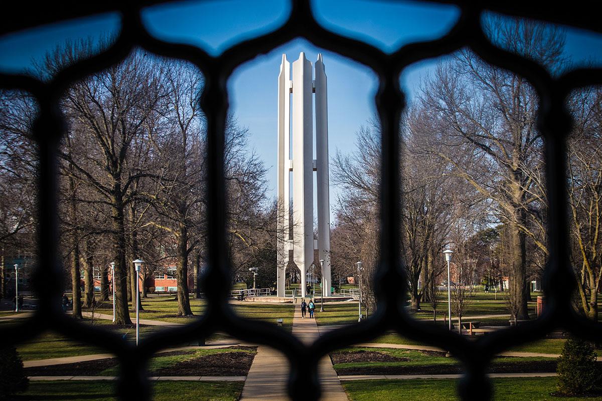 The Memorial Bell Tower as seen through windows in the Administration Building.
