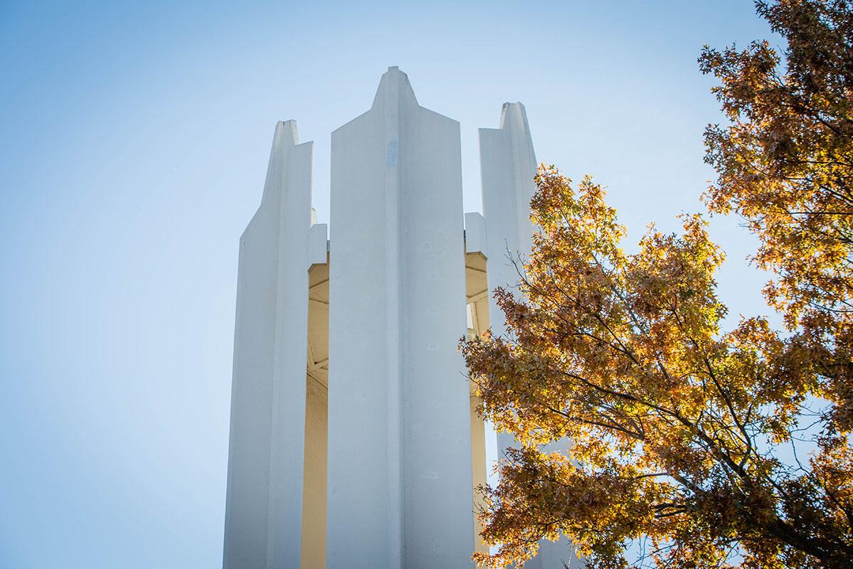 The Memorial Bell Tower stands above the Northwest campus on an autumn day.