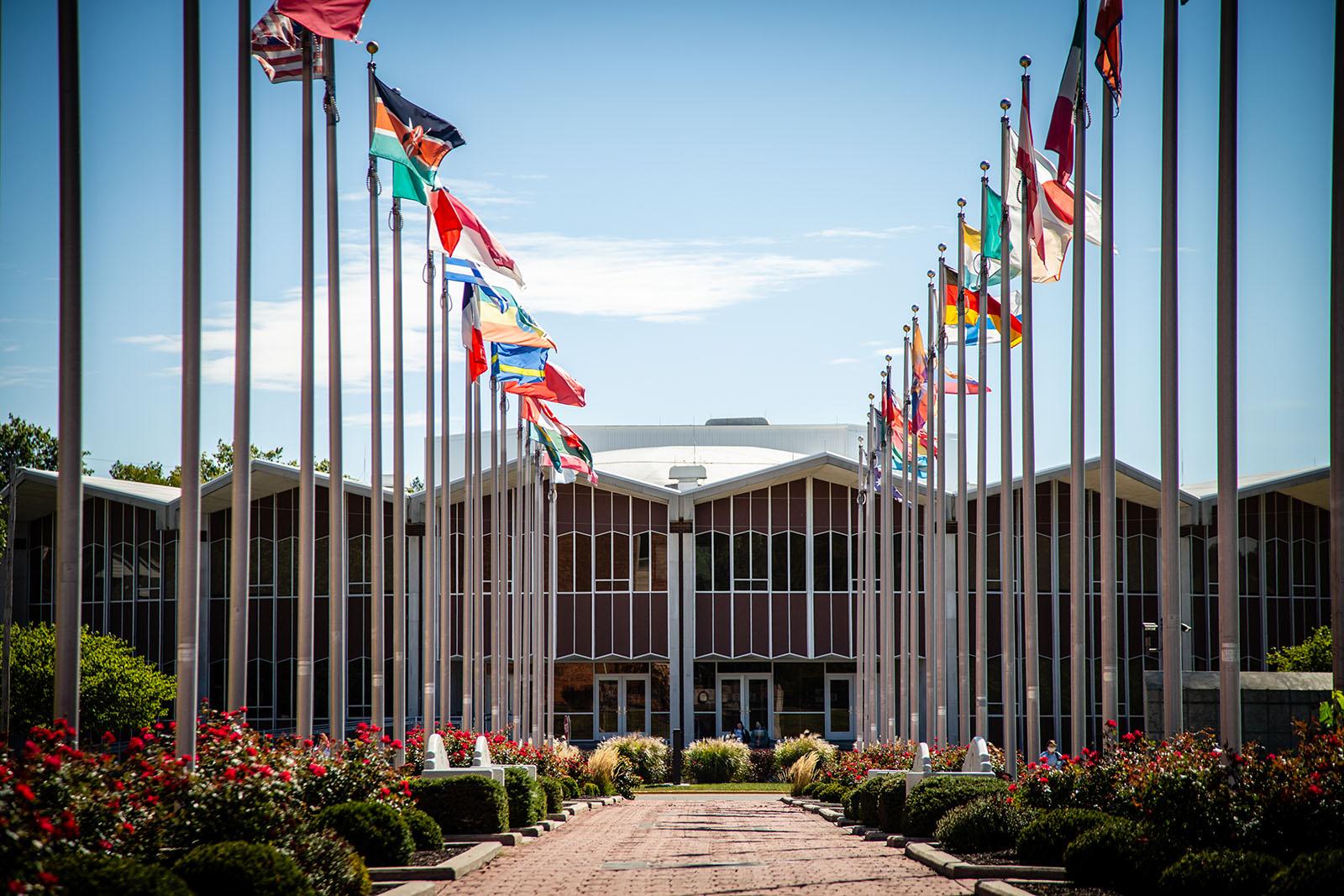 The Joyce and Harvey White International Plaza, which displays 54 flag as well as five clocks on the “Friends Wall & World Clock,” stretches approximately 300 feet from West Fourth Street on the southern edge of campus to the center of the campus.