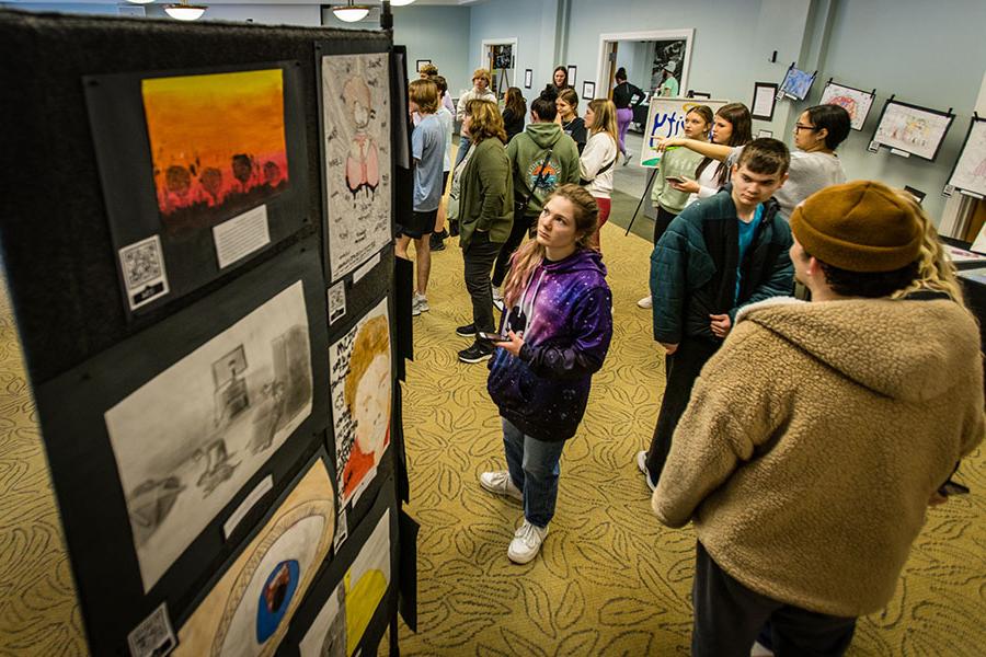 The Northwest community takes in art displayed during the University's 2023 I Will Listen event. (Photo by Lauren Adams/Northwest Missouri State University)